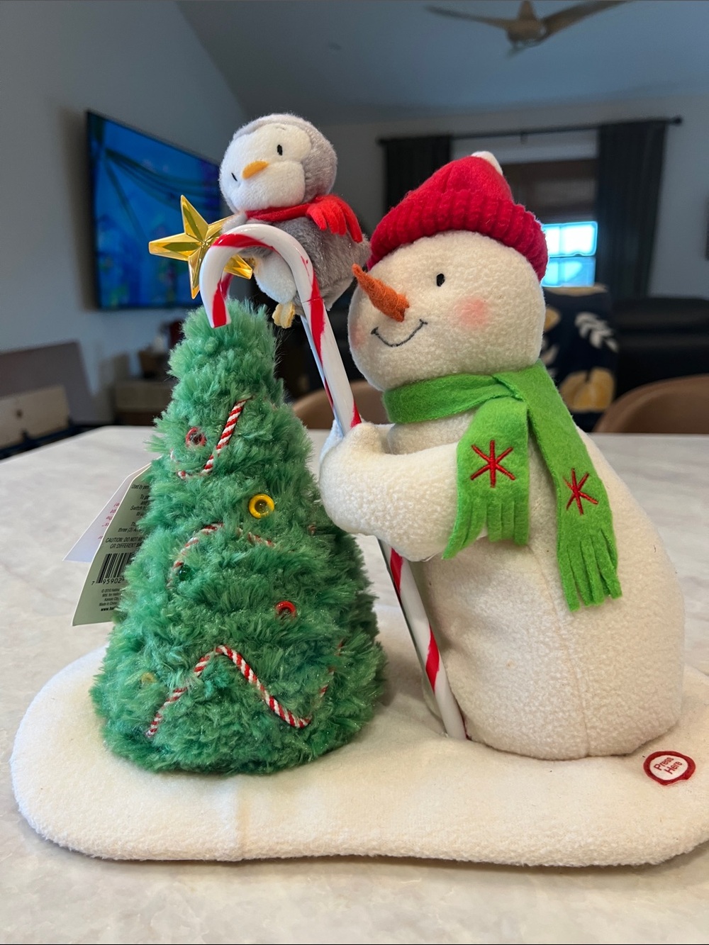 Hallmark Plush Snowman with Light-Up Green Tree and Red Hat
